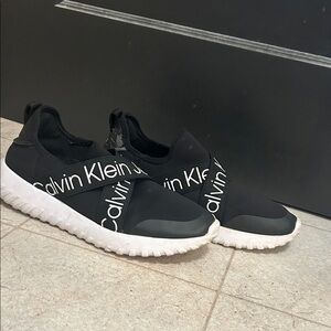 Calvin Klein Black and White Slip-On Shoes